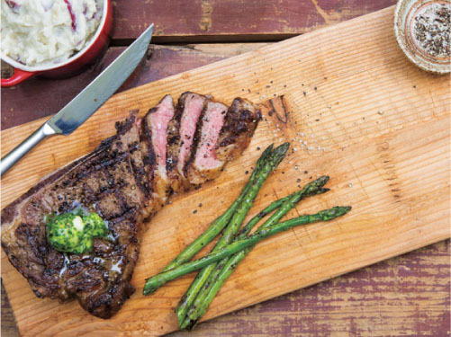 Balsamic-Marinated Steaks with Herb Butter and Grilled Asparagus